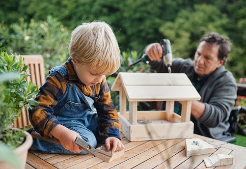 Building a birdhouse with family