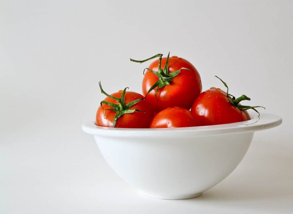 Red Tomatoes in White Bowl